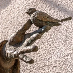 Close-up of Saint Francis of Assisi's hand.