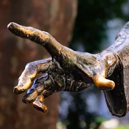 Close-up of Franz Liszt's bronze hand.