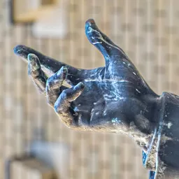Close-up of Nándor Zichy's bronze hand.