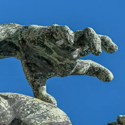 Close-up of the archer's drawing hand.