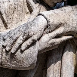 Close-up of the doctor's and caregiver's hands.