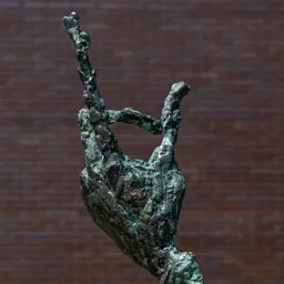 Close-up of the chess master's hand.