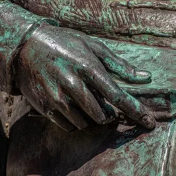 Close-up of Ferenc Kölcsey's hand.