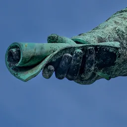 Close-up of Széchenyi's hand holding a rolled document.