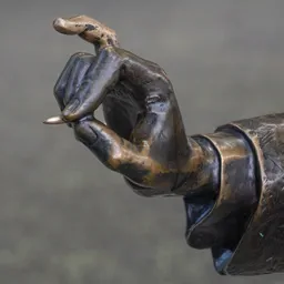 Close-up of Roskovics' drawing hand holding a pencil.