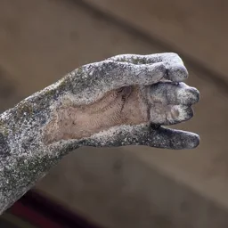 Close-up of the hand holding the invisible triangle.