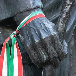 Close-up of Sándor Kőrösi Csoma's left hand holding a walking staff.