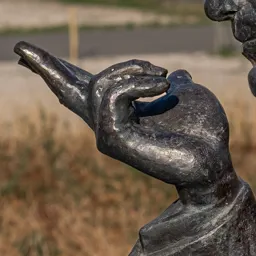 Close-up of József Antall Sr.'s open hand resting on the table.