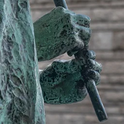 Close-up of the shepherd's hands holding the flute.