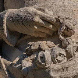 Close-up of Saint Elizabeth's left hand holding roses.